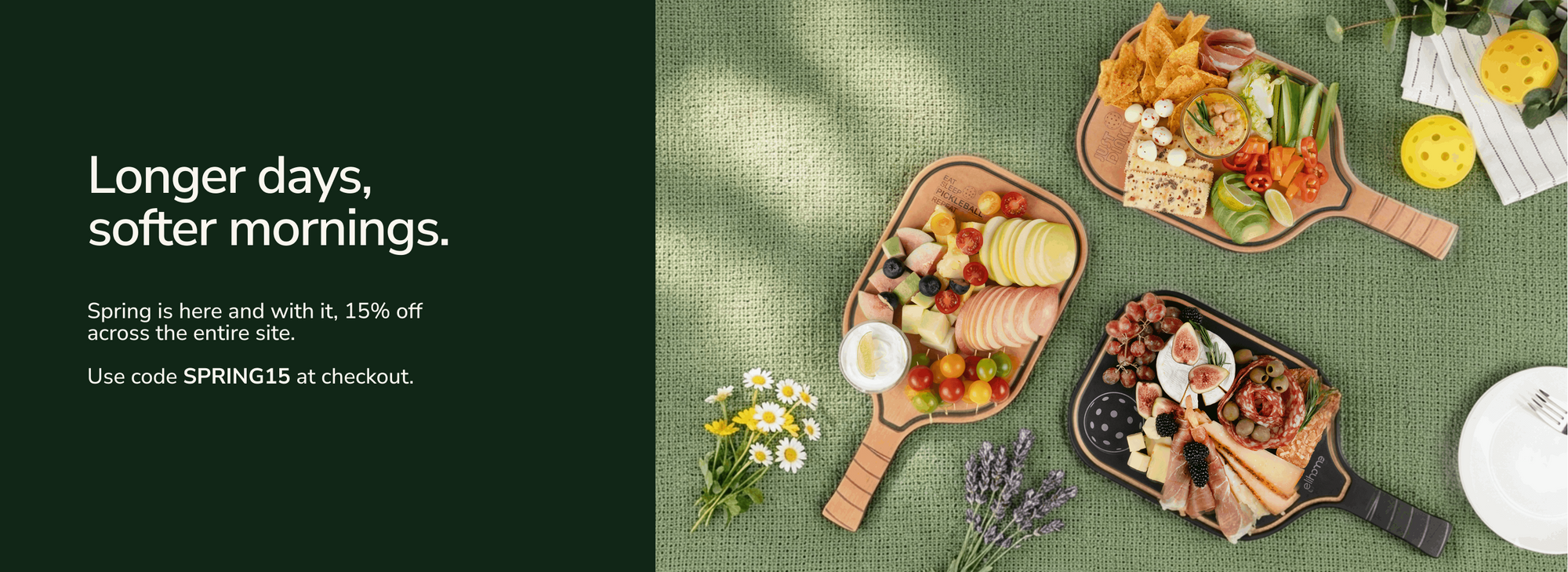 Three wooden platters with snacks on a textured surface, accompanied by flowers and a clock, with promotional text on a dark green background.
