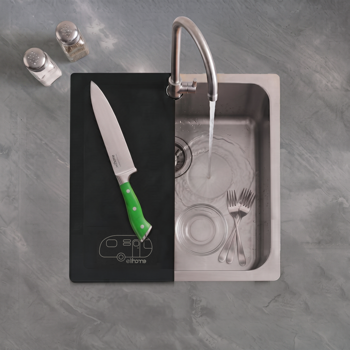 Knife and utensils resting in an RV sink beside the black Elihome Camper Series sink cover