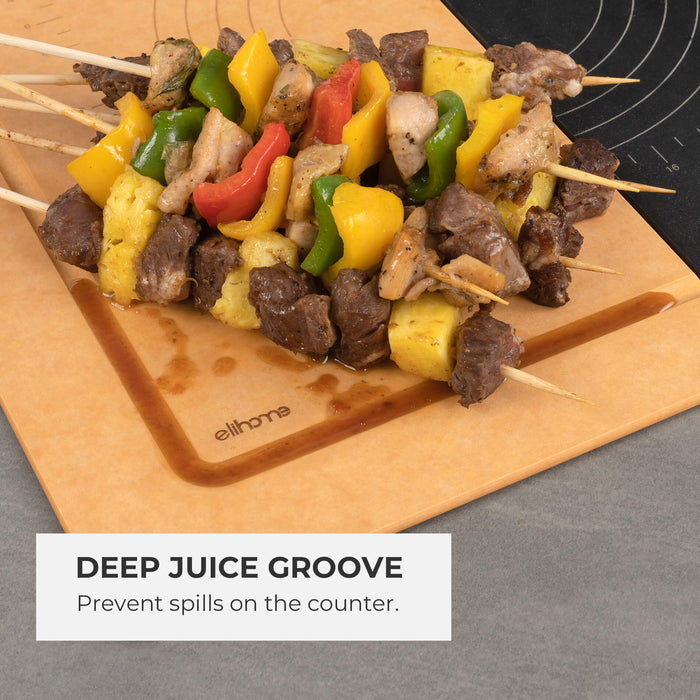 Overhead view of Elihome custom Airstream RV sink covers used as elegant serving platters. Features a black heat-resistant board with pizza and natural wood fiber boards holding charcuterie and shish kabobs, showcasing the "Oh Darling" and "Keep Going" engraved designs.