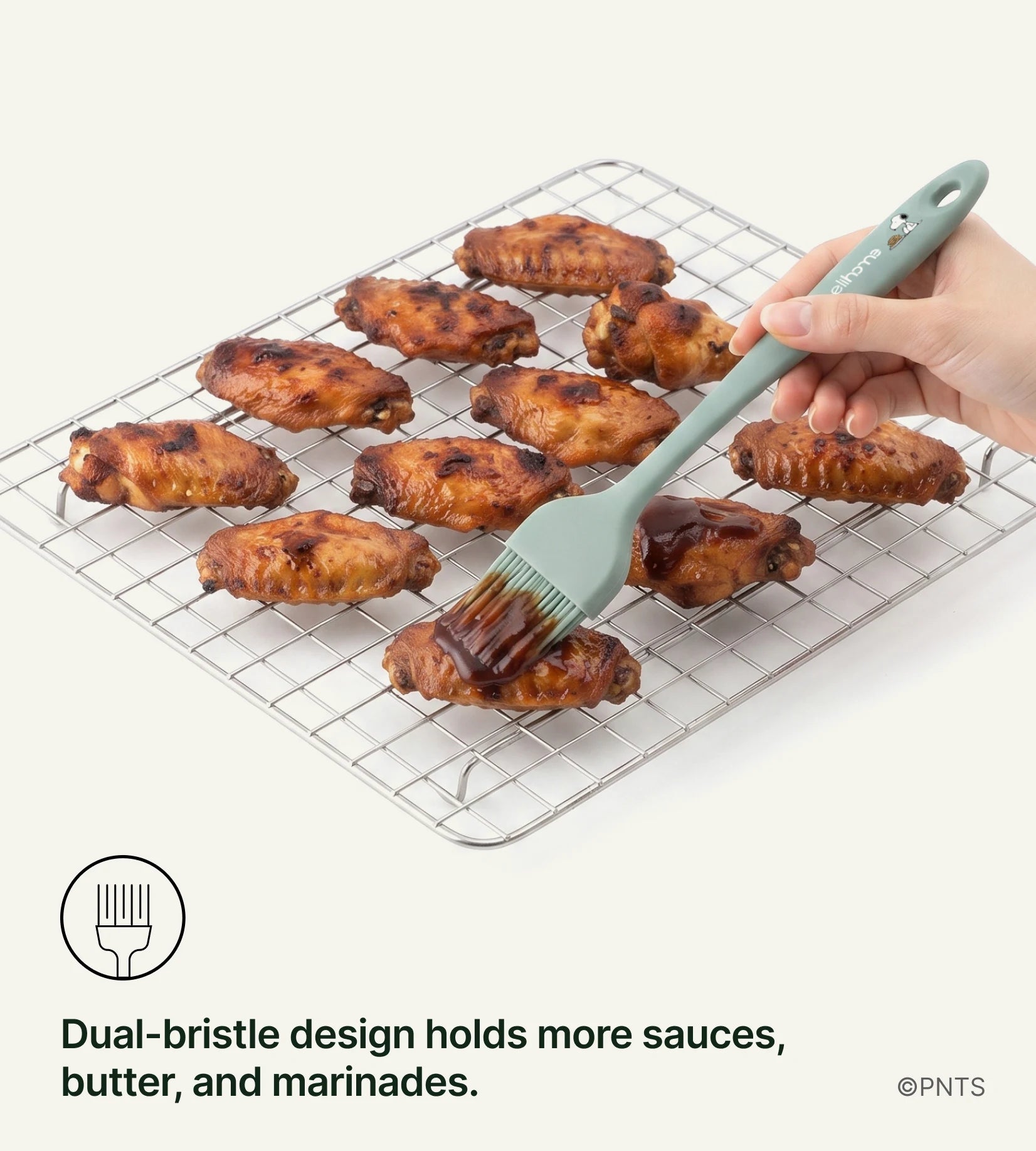 Dual-bristle design holds more sauces, butter, and marinades.